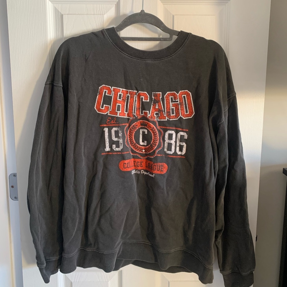 Medium oversized loose fit böhme sweatshirt in a charcoal grey color.